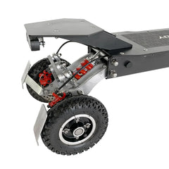 Close-up of a scooter's undercarriage with visible wheels and mechanical components on a white background.
