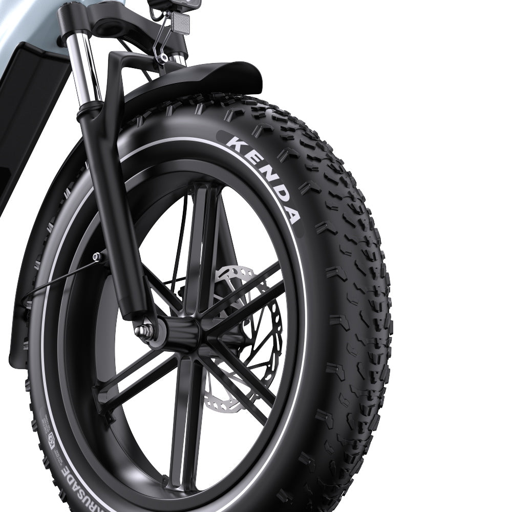 Close-up of a Onesport OT08 bicycle wheel with Kenda tire on a white background