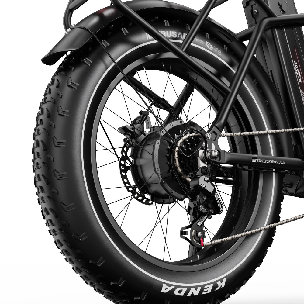 Close-up of a Onesport OT16 MAX Folding Electric bicycle wheel with Kenda tires on a white background