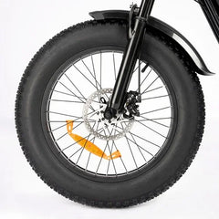 Close-up of a bicycle wheel with a white background