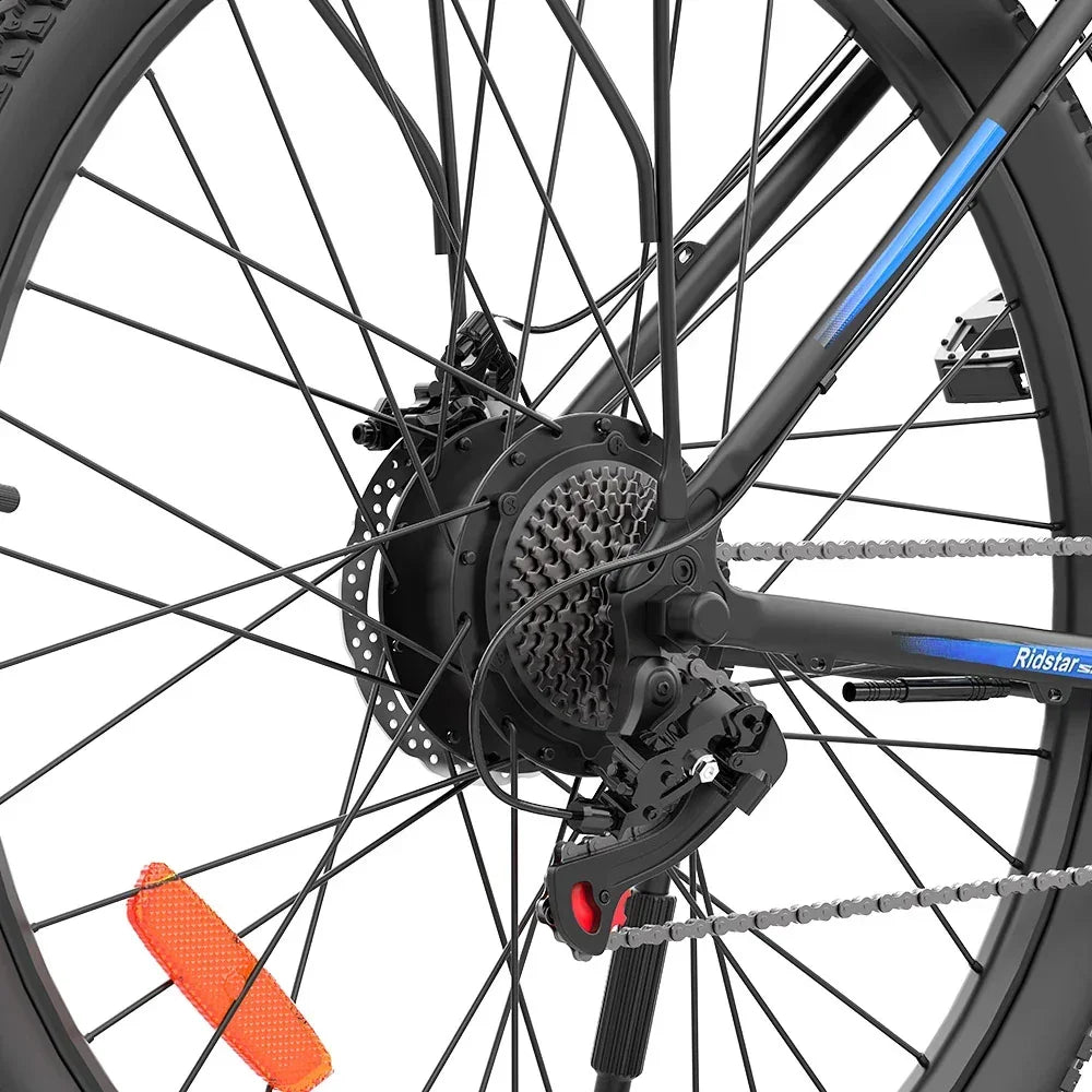 Close-up of a Ridstar S29 Pro Electric Mountain Bike wheel with gear and chain mechanism on a white background