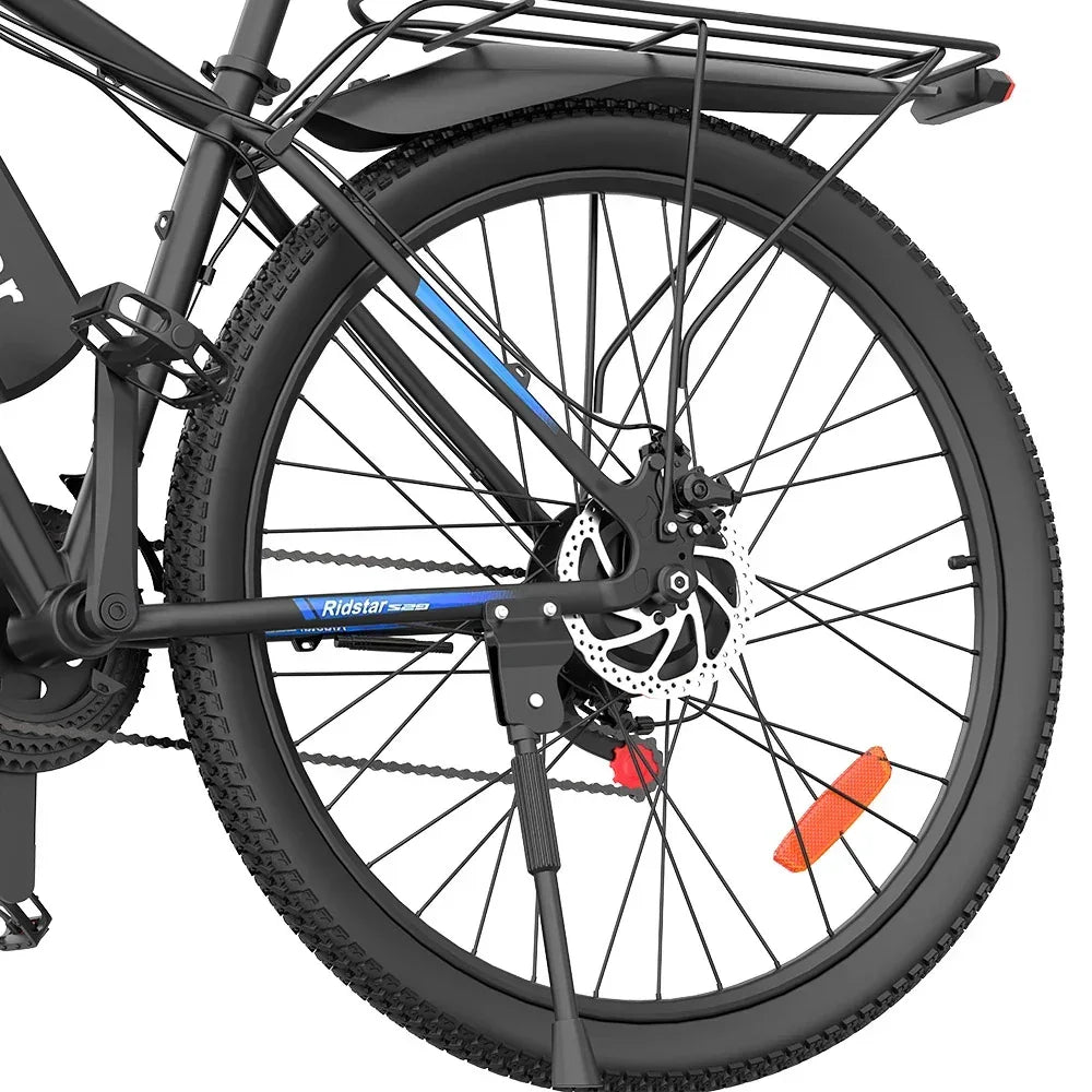 Close-up of a Ridstar S29 Pro E Mountain Bike wheel with disc brakes on a white background