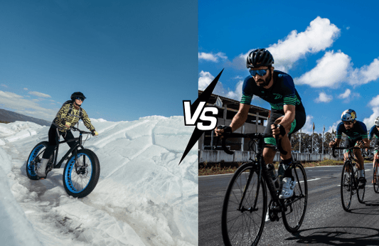 Fat tire electric bike riding on snowy terrain versus road bike racing on city street