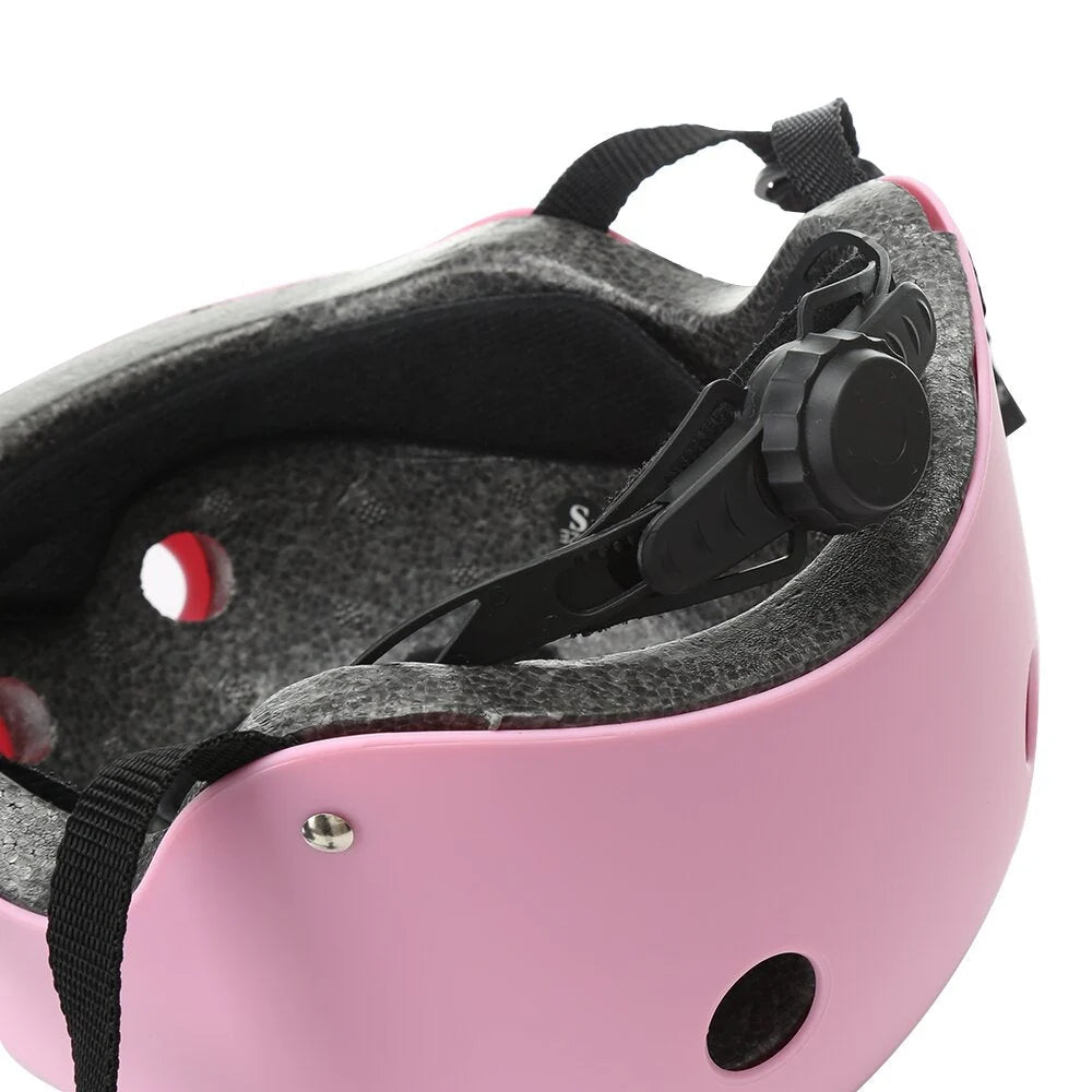 Close-up of a pink Hoverboard Kids Stylish Classic Helmet with a black chin strap on a white background